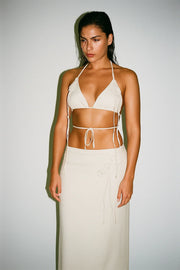 conjunto top e saia longa pipa.
