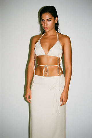 conjunto top e saia longa pipa.